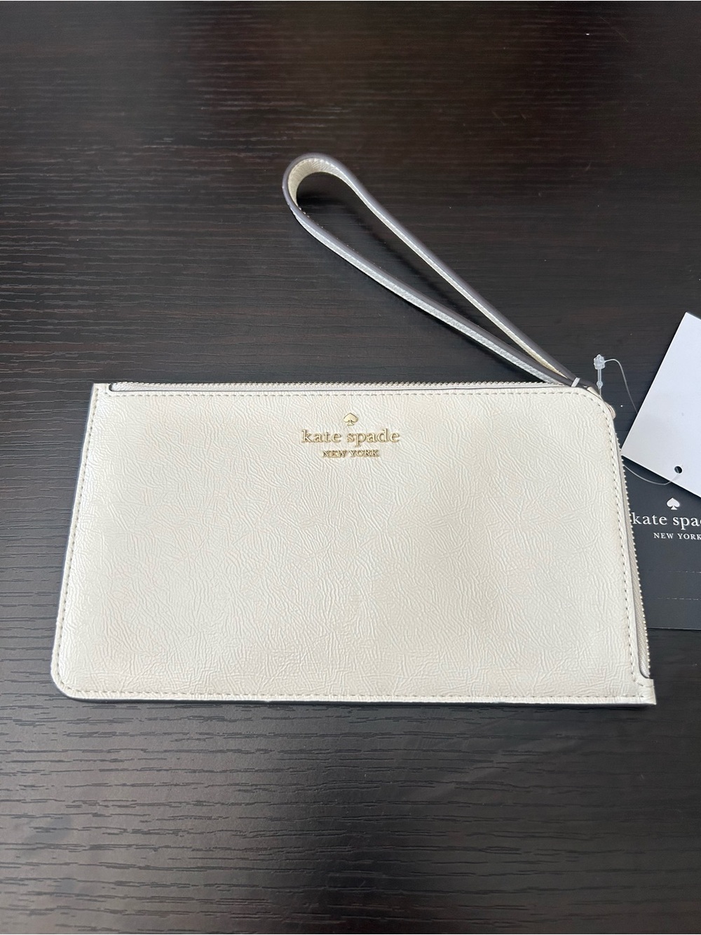 kate spade Lucy mid/zip Cream Leather Wristlet Clutch with Gold Logo